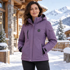 Veste de ski chauffante femme 9HEAT Solstice 6 violette portée en station