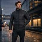 Doudoune chauffante homme Forge 9 portée lors d'un trajet froid