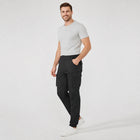 Pantalon chauffant homme Pant'R 8 porte sur fond studio clair